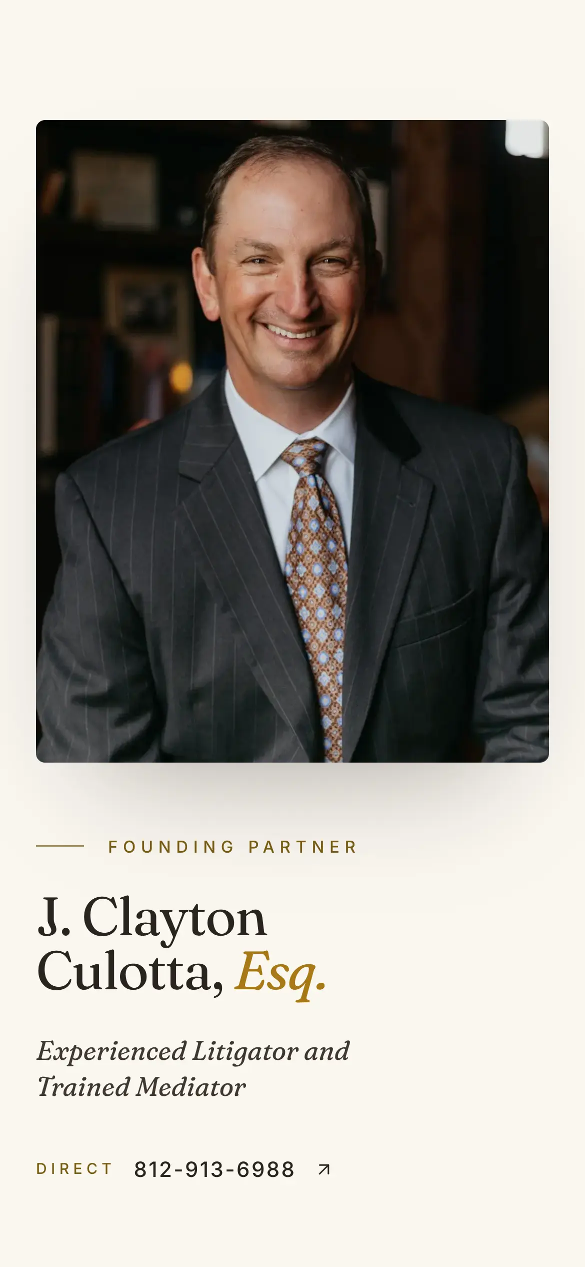 Mobile attorney profile hero for J. Clayton Culotta, with the founding partner title, specialty and a tap-to-call direct line.