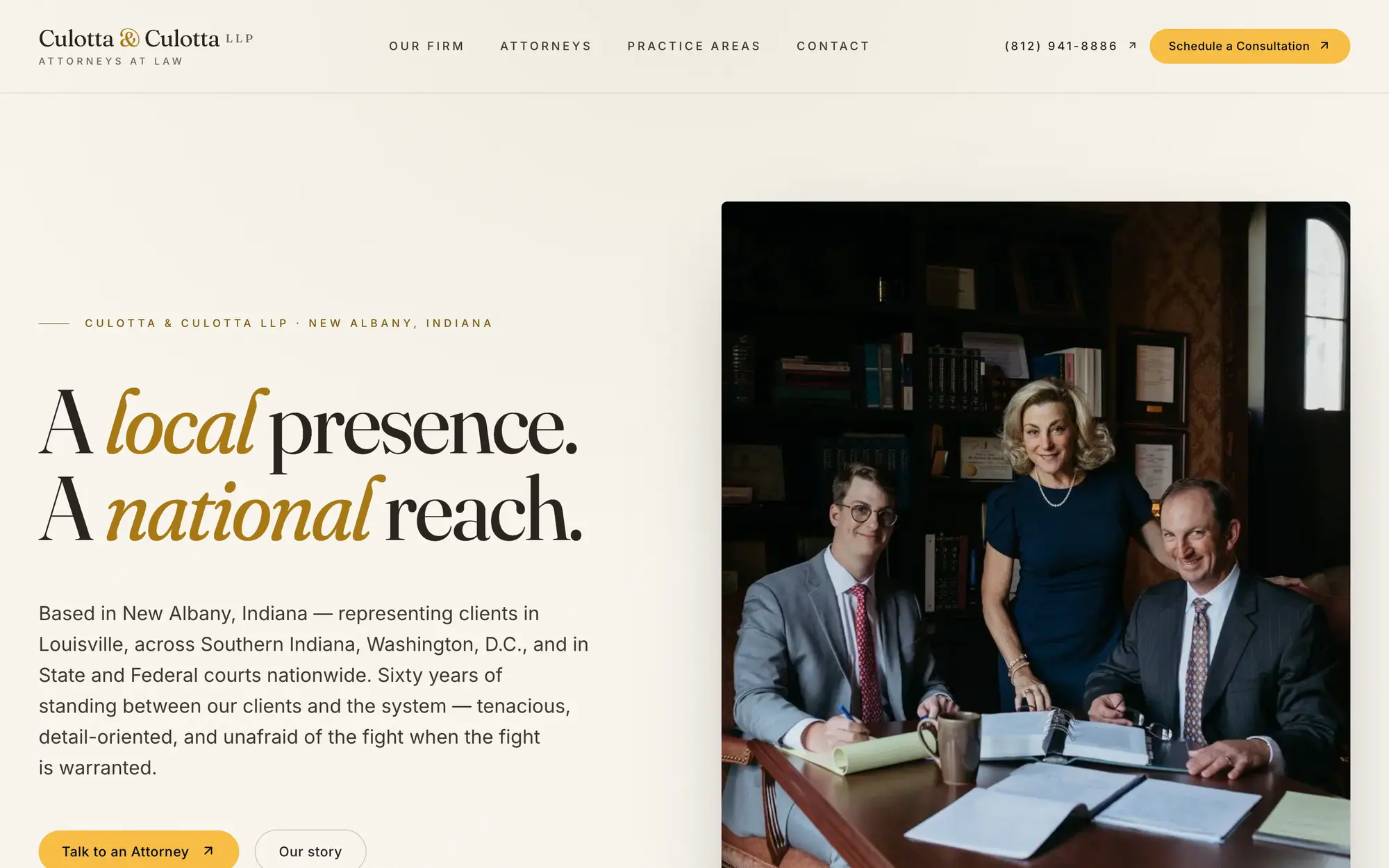 Desktop homepage hero, “A local presence. A national reach.,” pairing the firm’s New Albany story with a portrait of all three attorneys.